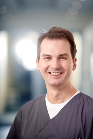 Dr. Adrian El-Karmi Dr. Adrian El-Karmi